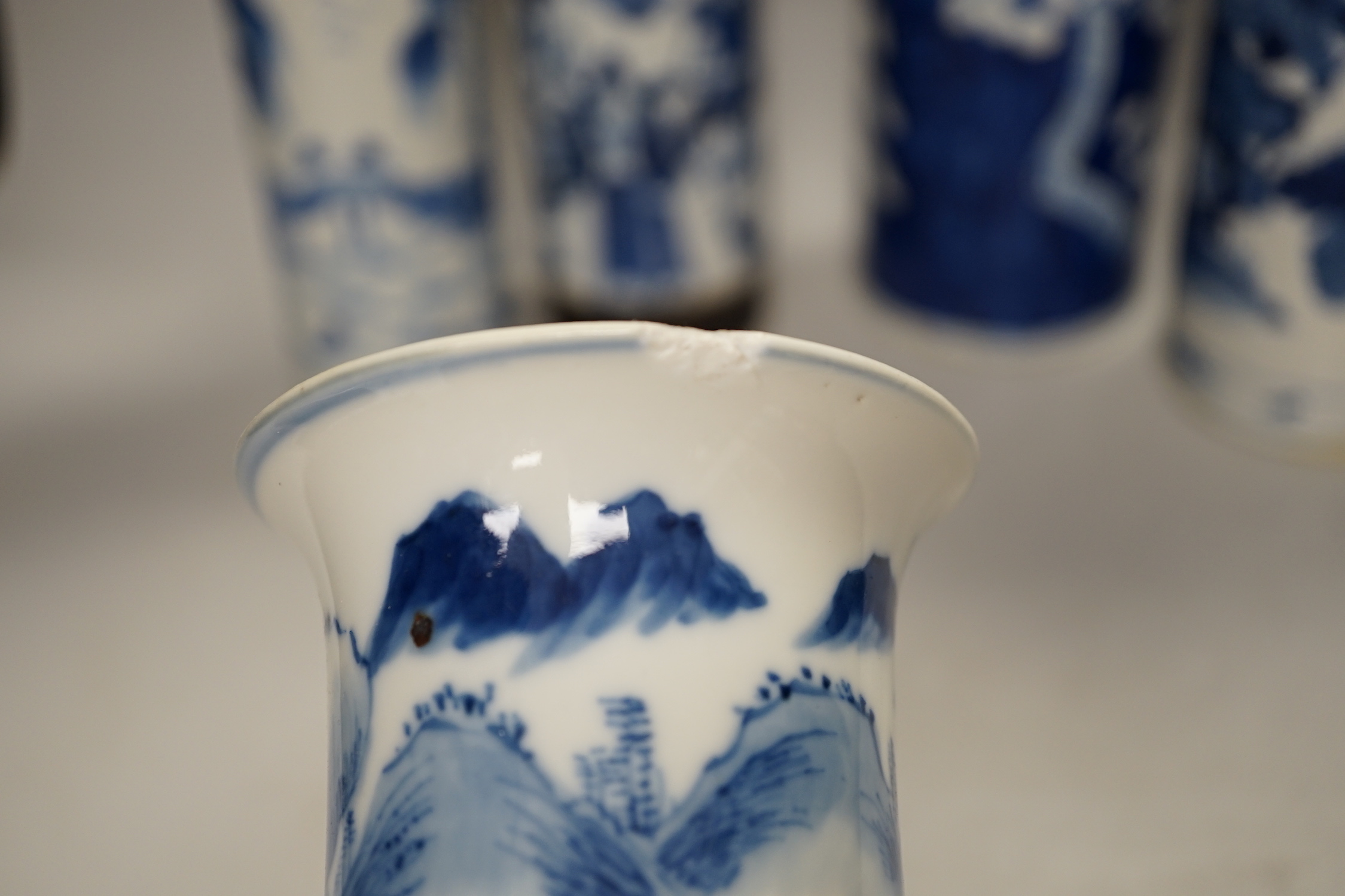 Nine assorted Chinese blue and white cylinder vases, 19th/20th century, tallest 30cm high (a.f.)